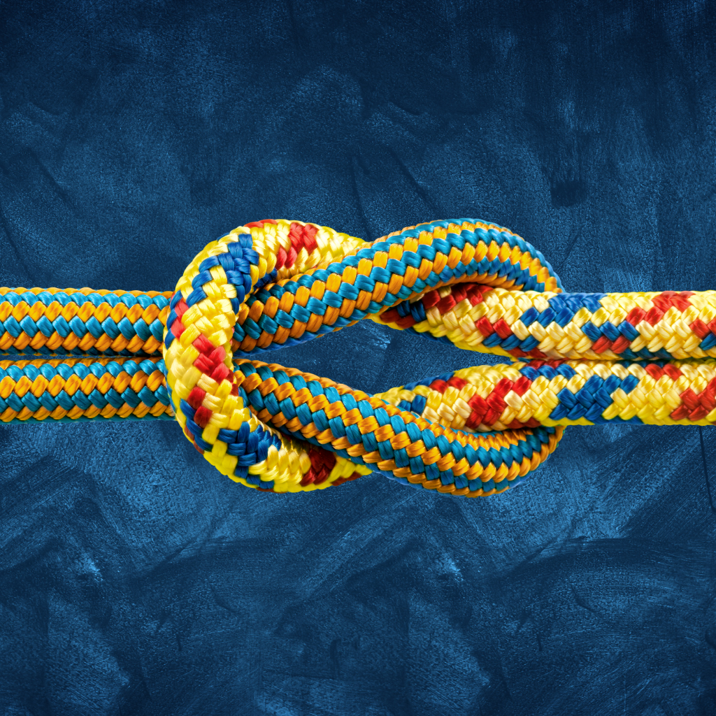 B2B Demand Generation - Rope knot in the infinity sign on a dark background