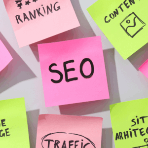 Pink and green sticky notes display SEO keywords: "SEO," "Ranking," "Content," "Traffic," and "Site Architecture."